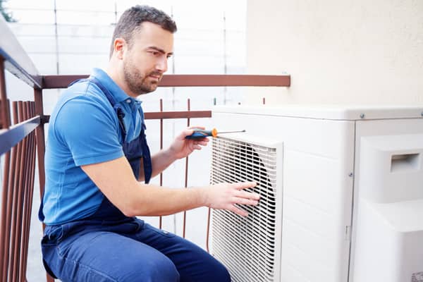 Qualified HVAC contractors for air conditioner installation.