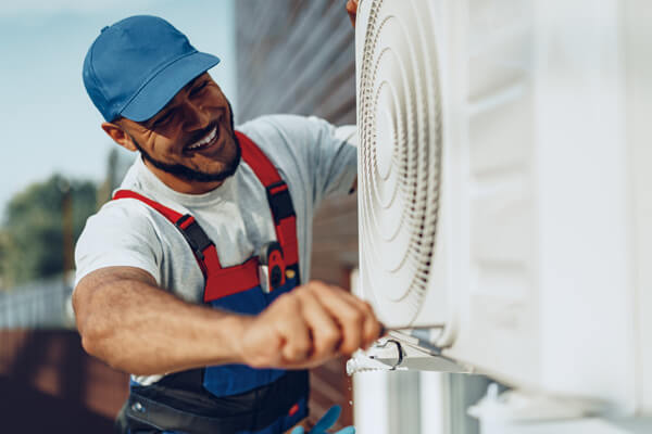 Professional installation of an air conditioning system.