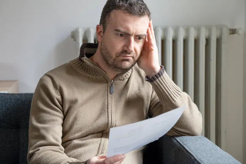 A homeowner shocked at expensive energy bill